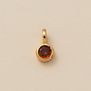 Golden flower hexagon pendant with round orange-red zircon birthstone for DIY necklaces