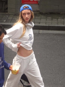 Detail of grey sweatshirt set with letter embroidery and high waist straight sports pants