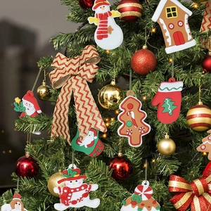 Detailed view of PVC Christmas tree ornaments including snowman and gingerbread house