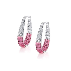 Macro side view of oval earrings featuring pink gradient crystals and pavé settings
