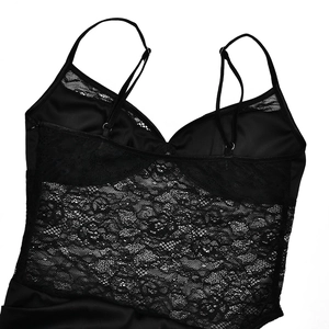 Detail view of black lace stitching on the back of a slim fit camisole bodysuit