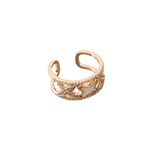 Adjustable rose gold cross ring with mother of pearl star and sparkling cubic zirconia