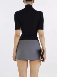 Minimalist women's fashion set featuring a black short-sleeve top and grey mini skirt