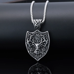 Detailed close-up of silver stainless steel reindeer pendant necklace with Viking compass shield