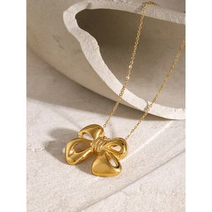 Elegant 18k gold plated stainless steel bow necklace with a polished finish for women