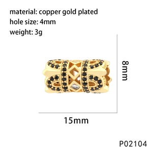 Macro shot of 15mm gold-plated hollow bead with black zircons and size specifications