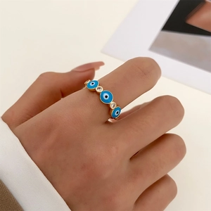 Detail of 14k gold-plated Evil Eye ring with blue enamel and micro-set cubic zirconia