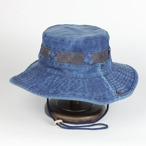 Detail of outdoor sun hat featuring breathable mesh panels and adjustable chin strap