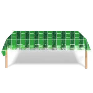 Detail of football field tablecloth with Touchdown text and yard line patterns