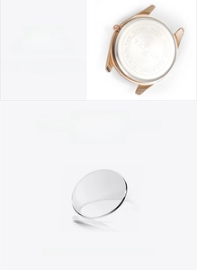 Detail of stainless steel back case and mineral glass mirror of the luxury gold watch