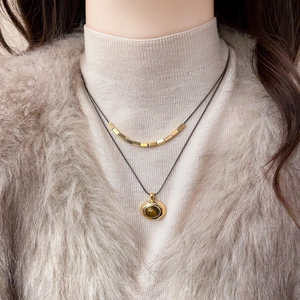 18k gold plated double layer tiger eye necklace with hexagonal pendant on model