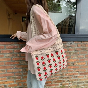 Crochet knit tote bag with red strawberry pattern and long shoulder strap for women