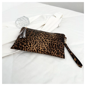Leopard print clutch bag with stylish fringe zipper and wrist strap detail