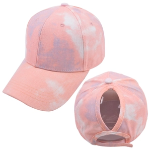 Detail of the ponytail hole and tie-dye cotton fabric on a summer baseball cap