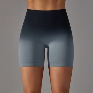 Detail of high waisted seamless yoga shorts with blue gradient and ribbed waistband
