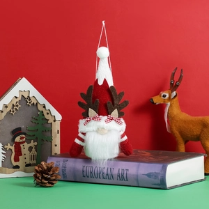 Poupée gnome de Noël avec bois de renne et motif rouge et blanc pour décoration