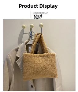Detailed texture of khaki plush handbag hanging against a cozy beige coat backdrop