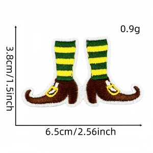 Detail view of St. Patrick's Day elf shoe patches showing sizes 6.5cm and 3.8cm