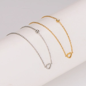 Elegant gold and silver stainless steel heart pendants with sparkling zircon stone