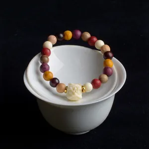 Bracciale Etnico in Perline di Legno Multicolore Con Ciondolo Leone in Noce d'Avorio Intagliato Gioielli Folk Cinesi Tradizionali Retro