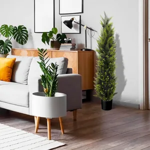 Artificial evergreen cedar tree for home decor with sleek black pot and dense green foliage