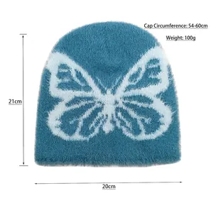 Plush turquoise butterfly knit beanie hat with fuzzy texture for winter warmth