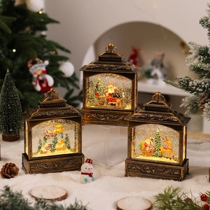 Retro bronze Christmas lantern with Santa scene, glitter snow effect and warm LED light