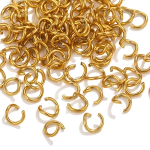 Macro shot of 18K gold-plated stainless steel open jump rings for DIY jewelry making