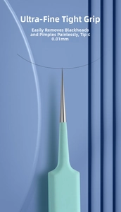 Detail of professional blackhead tweezers with 0.01mm precision tip for acne removal