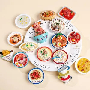 Top-down view of a 15-piece miniature food magnet set on a white decorative plate