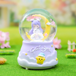 Close-up of rabbit girl on crescent moon inside purple musical crystal ball night light