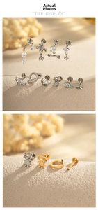 Macro detail of G23 titanium labret studs with zircon fishbone moon and heart designs