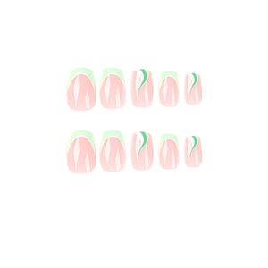 French tip press on nails with green and white wave design on light pink base