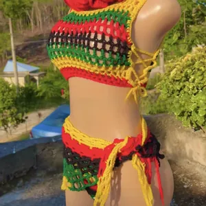 Detail of handmade crochet bikini set with vibrant red yellow and green rasta patterns