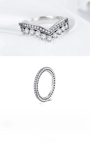 Macro shot of 925 sterling silver V-shape and heart cutout ring with cubic zirconia