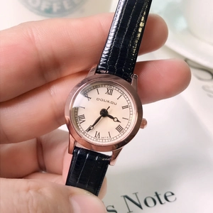 Elegant ladies quartz watch with rose gold case, cream Roman dial and black leather strap