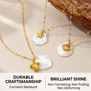 Detailansicht von 18K Gold-Meeresanhängern mit Muscheln, Seesternen und Meeresschildkröten
