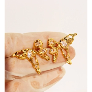 Golden liquid metal butterfly earrings with zircons and artistic irregular texture