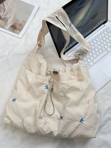 Borsa tote in tela a quadri con ricamo a fiocco colorato e chiusura a coulisse