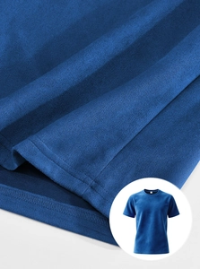 Close-up detail of blue cotton blend t-shirt fabric texture and round neck design