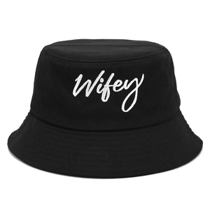 Black cotton bucket hat featuring white Wifey script embroidery and stitched brim