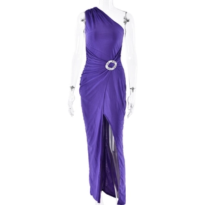 Detail of purple one-shoulder maxi dress featuring a crystal buckle and side slit