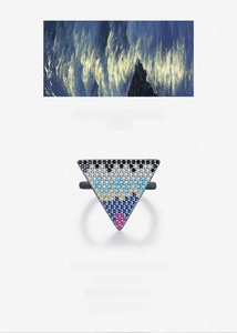 Macro detail of pixel-style inverted triangle ring with multicolor pave setting