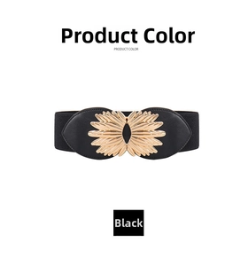 Detail of sunflower alloy buckle on black elastic waist belt for elegant styling
