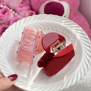 Elegant acetate heart hair claw clips with rhinestones in pink and red colors