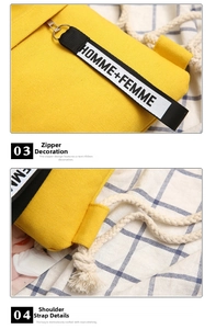 Detail of yellow canvas bag featuring alphabet ribbon zipper and woven cotton rope straps