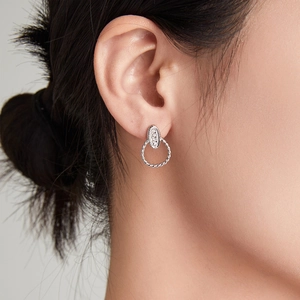 Elegant twisted hoop earrings in silver plated titanium steel with cubic zirconia accents