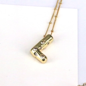 Polished 18k gold plated letter L bubble pendant necklace with sparkling cubic zirconia