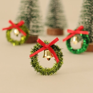 Miniature Christmas wreath with red bow and gold bell ornament for DIY holiday scenes