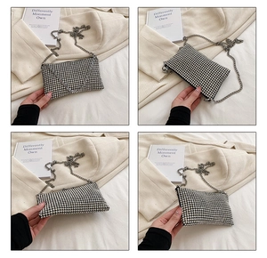 Close-up of sparkling silver rhinestone mini handbag with elegant metal chain strap